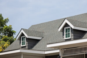 Asphalt roof shingles with garret house on top of the house in South Florida